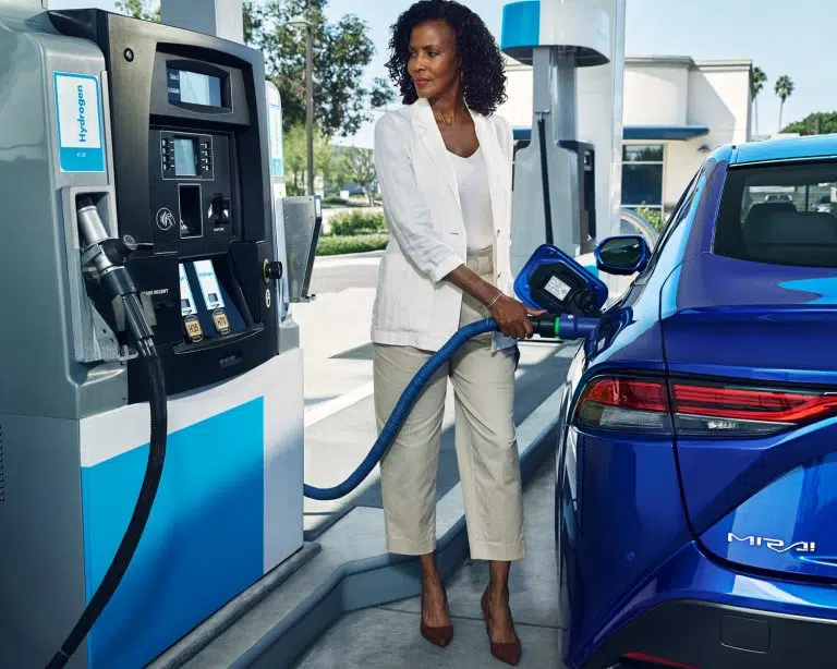 toyota-2025-mirai-xle-hydro-blue-at-charging-station-l